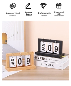 Detail of wooden perpetual flip calendar showing month and date on a minimalist desk