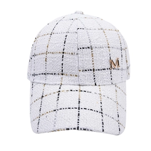 Plaid tweed baseball cap in white with gold and black threads and metal M accent