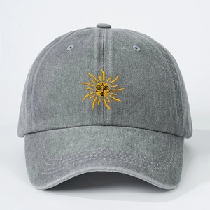 Grey washed denim baseball cap with sun face embroidery for outdoor sun protection
