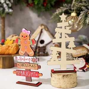 Creative gingerbread man and wooden Christmas tree tabletop ornaments with festive decor