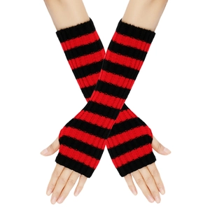 Detail of red and black striped knitted fingerless arm warmers on model hands