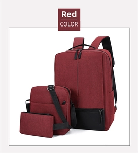 Three-piece red oxford cloth set including backpack, crossbody bag, and clutch