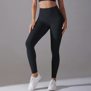 Detailed view of high-waist seamless black yoga leggings with tummy control compression