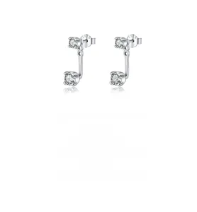 Close-up of S925 sterling silver stamp and dangling zircon stud earrings details