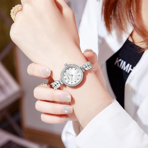 Elegant silver mermaid bracelet watch for women with sparkling crystal diamond accents
