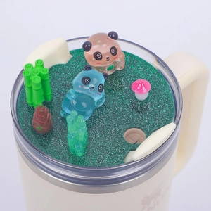 Luminous 40oz tumbler nameplate lid featuring cute 3D pandas and bamboo micro landscape