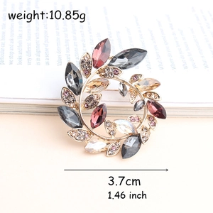 Golden wreath brooch with colorful marquise crystals, 3.7cm diameter, elegant vintage style