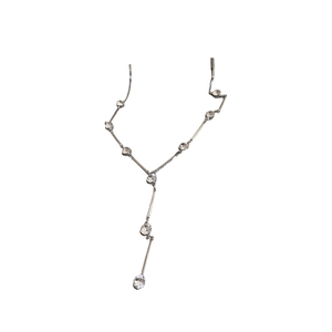 Silver Y-shaped pendant necklace with crystal accents and minimalist long chain design