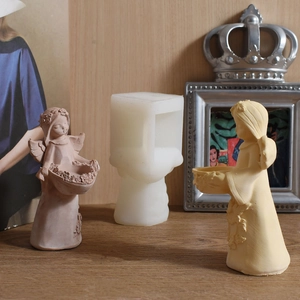 Detail of angel girl silicone mold for DIY resin candle holders and gypsum flower pots