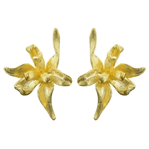 Macro detail of golden 3D iris flower earrings with realistic matte brushed texture