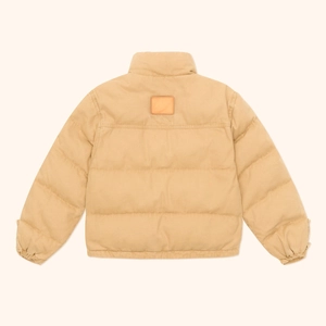 Rear view of khaki explorer puffer jacket featuring quilted padding and high-stand collar