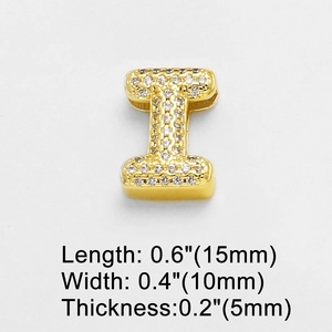 Macro shot of 15mm gold letter I charm with pavé cubic zirconia for DIY bracelets