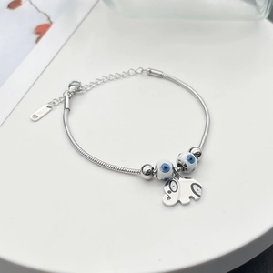 Silver stainless steel elephant and evil eye charm bracelet with snake chain structure