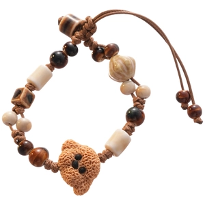 Handmade ceramic beaded bracelet with brown bear charm and adjustable wax rope strap