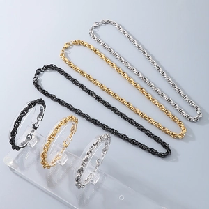 Polished stainless steel twist chain necklace and bracelet sets in black, gold, and silver