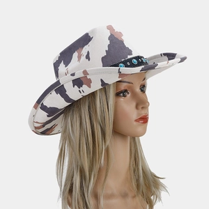 Classic white cow print western cowboy hat with turquoise studded black band accent