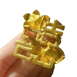 Matte gold floral brooch with Xi character design and traditional Chinese aesthetic