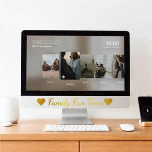 Golden Family Fun Time stickers with heart pattern applied on a computer monitor frame