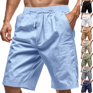 Detail view of men's linen beach shorts with elastic drawstring waist in eight colors