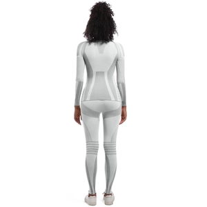 Detailed back view of white seamless athletic set with gray compression patterns and texture
