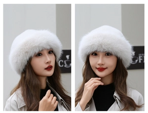 Detail view of white faux fur winter hat showing plush texture and stylish mink-style design