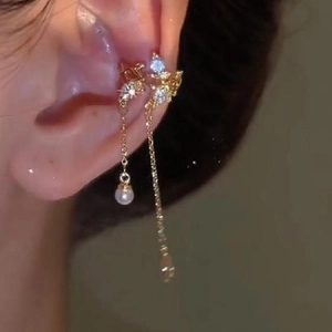 Gold butterfly ear cuff with shimmering tassels, rhinestones and elegant pearls