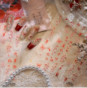 Detail of M1345 bamboo and butterfly nail stickers with red and silver metallic finish