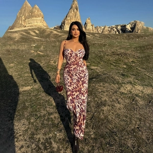 Slim fit leopard print sleeveless maxi dress with deep V-neck and open back