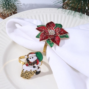 Christmas napkin rings with red poinsettia and Santa Claus designs for festive table decor