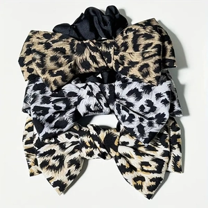 Three-piece leopard print bow scrunchie set in brown, gray, and tan vintage style