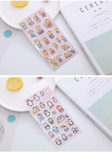 Detail of 3D cartoon bubble stickers featuring monkey and penguin themes for kids