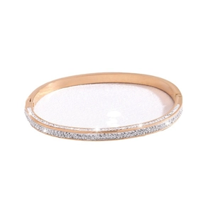 Elegant rose gold titanium steel bracelet featuring double-row star-like crystal pavé setting