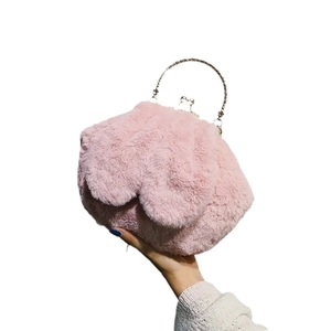 Pink faux fur plush handbag with metal ring handle and shell-shaped cloud design for women