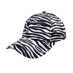 Detail shot of a zebra striped ponytail baseball cap with a classic curved visor design