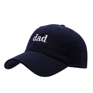 Classic navy blue cotton baseball cap with white 'dad' embroidery on white background
