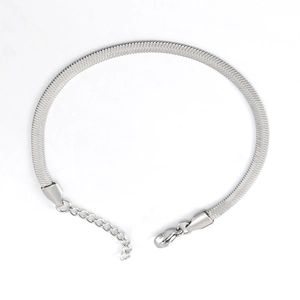 Close-up of silver flat snake bone chain bracelet with adjustable lobster clasp detail