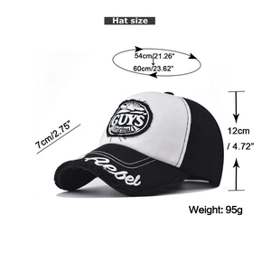 Detailed view of GUYS embroidery on cotton baseball cap with size measurements