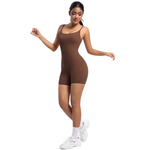 Detailed close-up of dark brown athletic romper with thin straps and U-neck design