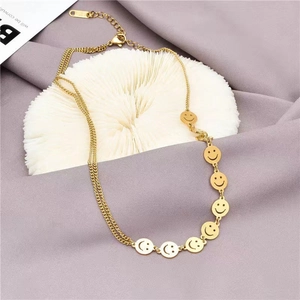 Double layered gold stainless steel choker necklace with multiple smiley face charms