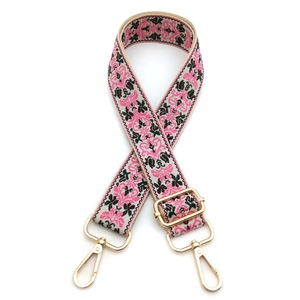 Pink and black floral jacquard adjustable shoulder strap with gold metal hooks