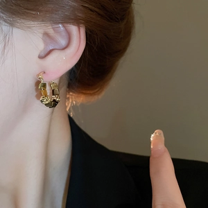 Maillard style geometric hoop earrings with tiger eye stone and gold plated metal
