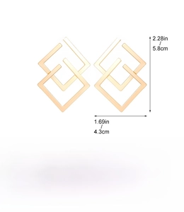 Detailed view of geometric diamond earrings with dimensions 5.8cm height and 4.3cm width
