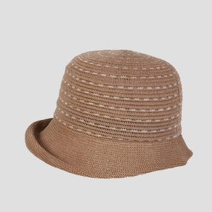Detail showing brown linen knit texture and white striped pattern on the sun hat brim