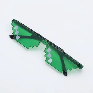 Close-up of translucent green pixel sunglasses in Thug Life style with stepped edges