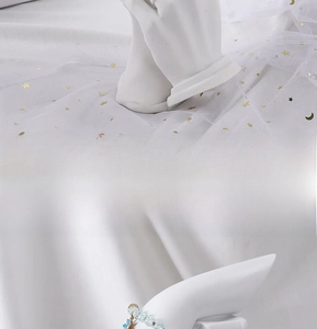 Detailed view of resin hand mannequin stand displaying rings for jewelry storage