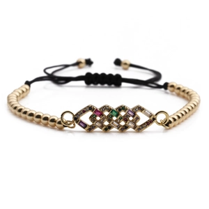 Adjustable gold copper bracelet featuring geometric colorful zircon stones on white background