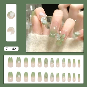 Faux ongles adhésifs avec dégradé vert, papillon 3D, camélia et détails de ruban