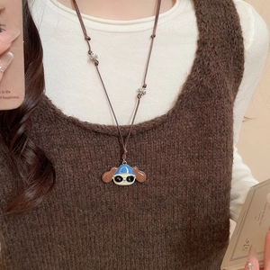 Detail of cartoon animal pendant with oil drip craft and braided leather necklace cord