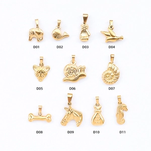 Collection of 11 gold titanium steel animal pendants like elephant and bird shapes