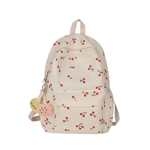 Sac à dos en velours côtelé imprimé cerise avec pendentif peluche sur fond blanc